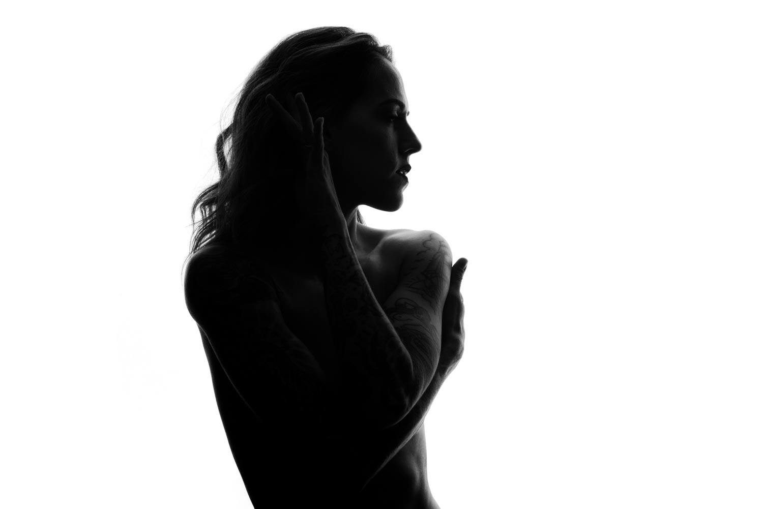 a silhouette portrait of Christina in black and white.